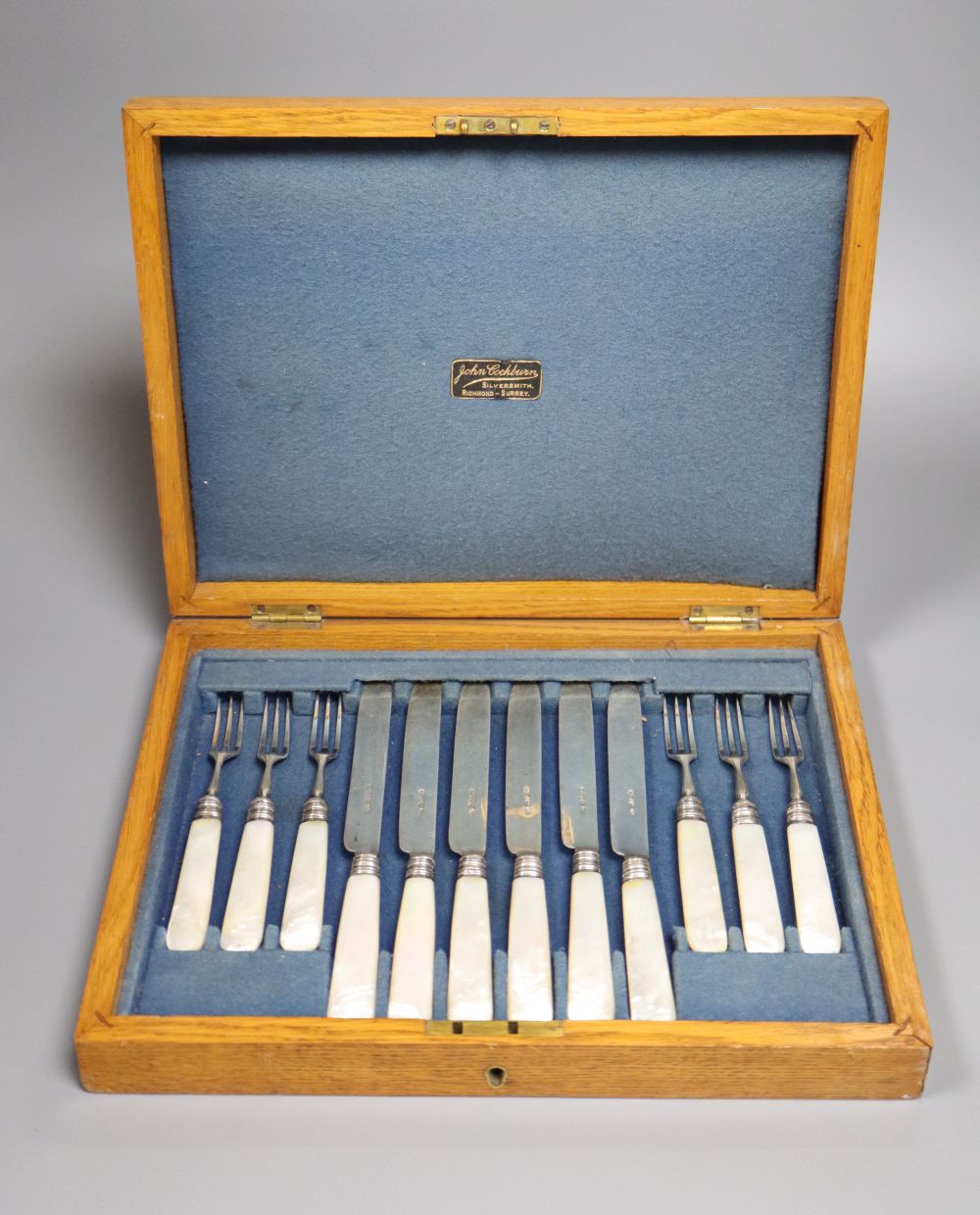 A set of ten William IV mother of pearl handles dessert knives, Atkin & Oxley, Sheffield, 1836 and a set of later similar forks